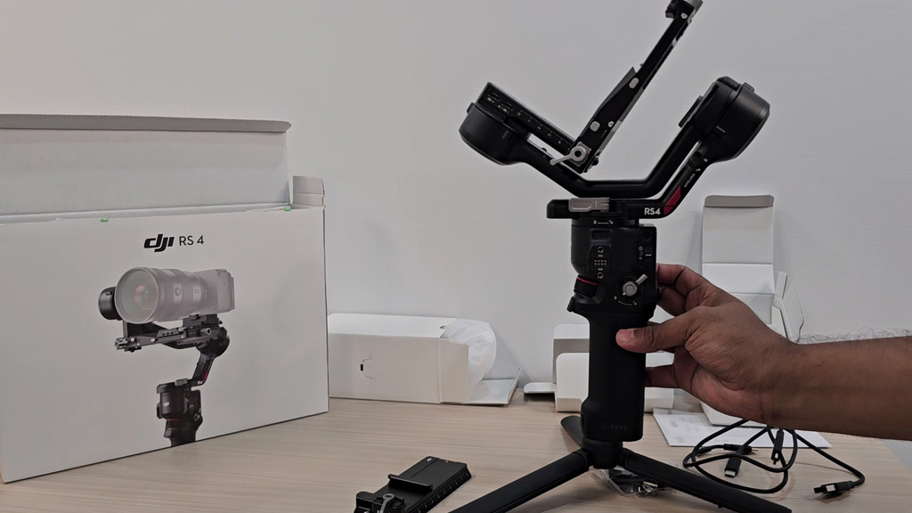 DJI RS 4 fully assembled and standing on its tripod