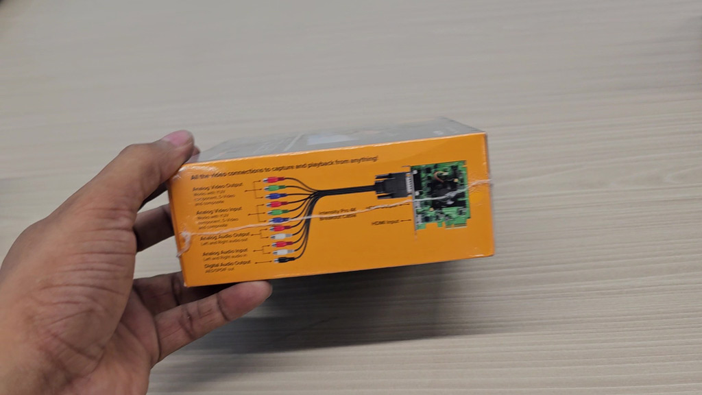 Side of the Intensity Pro 4K box showing the breakout cable connections