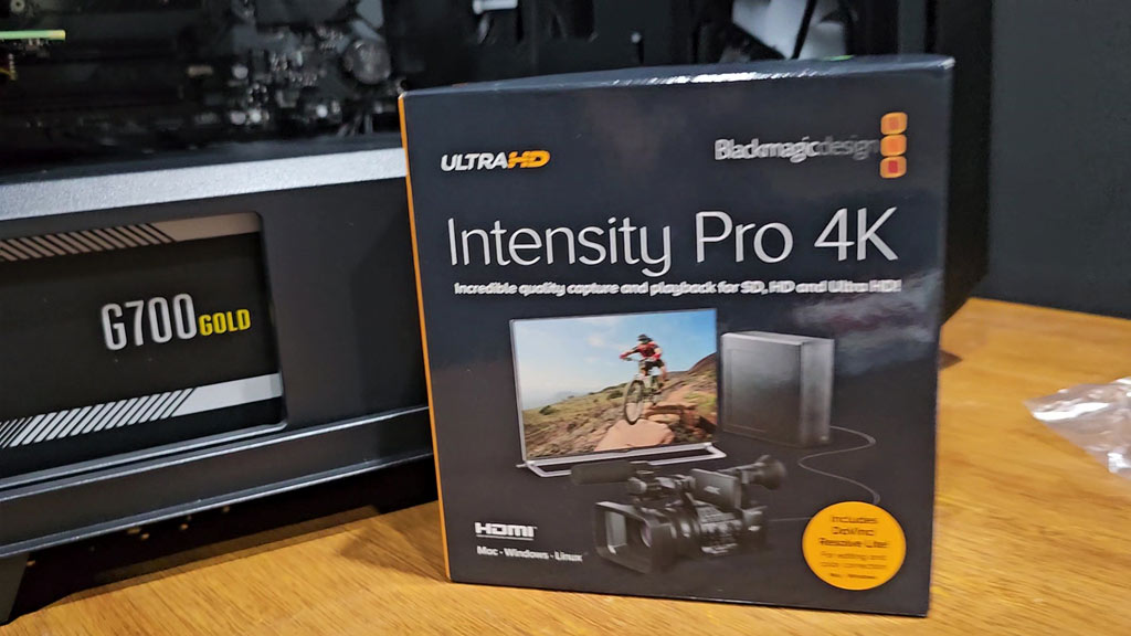 Intensity Pro 4K box standing in front of a desktop PC