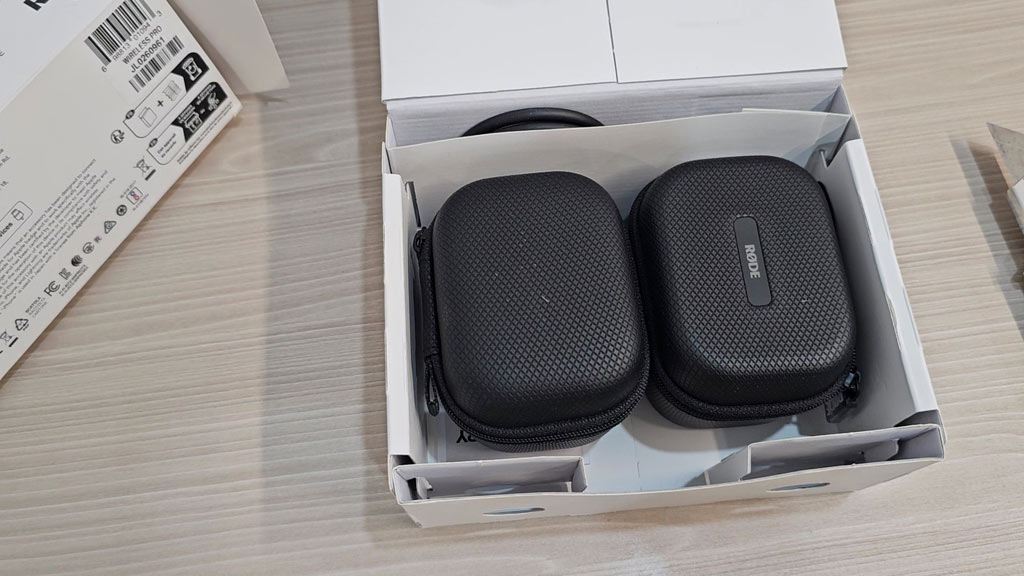 Two zip cases inside the RØDE Wireless PRO box
