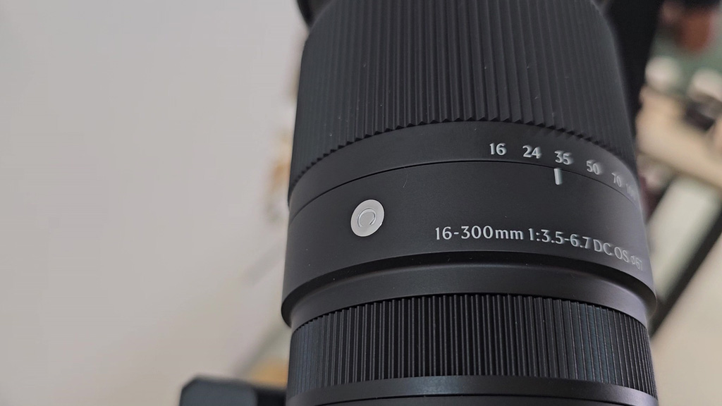 Lens name ring reading 16-300mm 1:3.5-6.7 DC OS