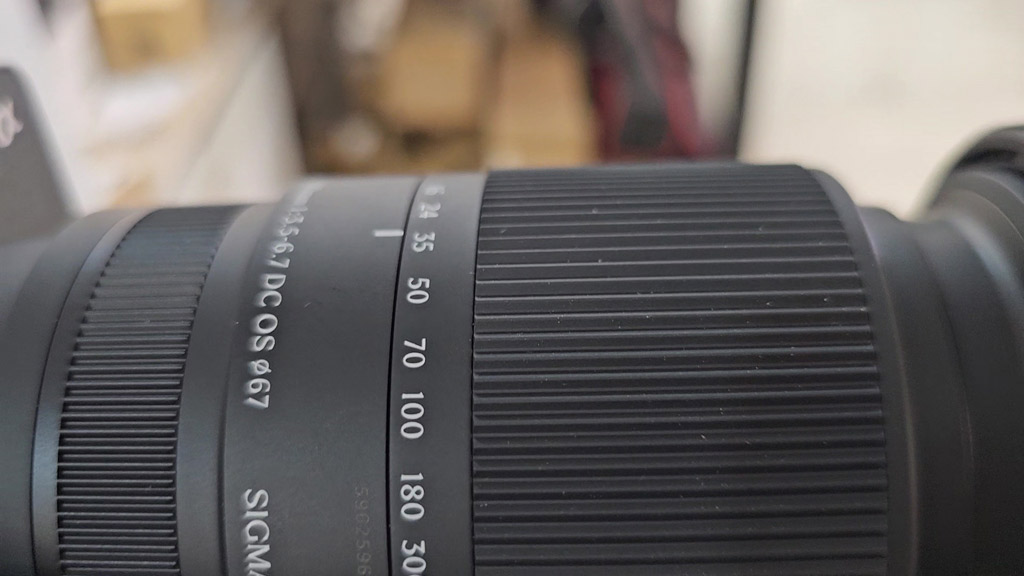 Zoom scale on the Sigma 16-300mm with focal length markings up to 300